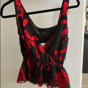 Rachel Zoe Blacktop with embroidered red flowers.